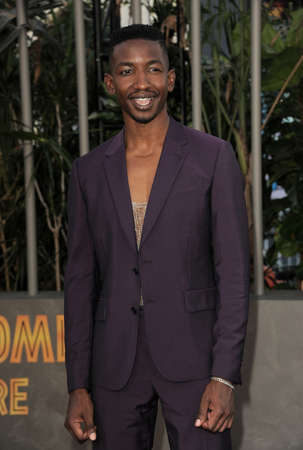 Mamoudou Athie at the Los Angeles premiere of 'Jurassic World Dominion' held at the TCL Chinese Theater in Hollywood, USA on June 6, 2022.のeditorial素材