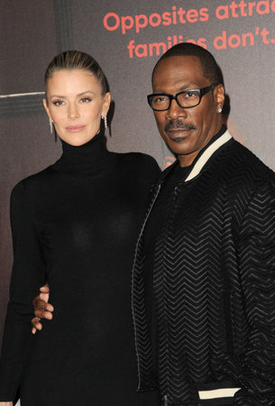 Eddie Murphy and Paige Butcher at the Los Angeles premiere of Netflix's 'You People' held at the Regency Village Theatre in Westwood, USA on January 17, 2023..のeditorial素材