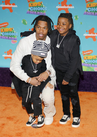 Loyal Jones, Lil Baby, and Jason Jones at the Nickelodeon Kids' Choice Awards 2023 held at the Microsoft Theater in Los Angeles, USA on March 4, 2023.のeditorial素材