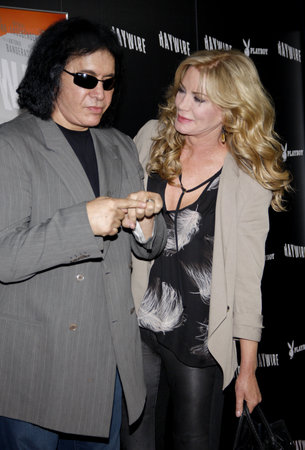 Gene Simmons and Shannon Tweed at the Los Angeles premiere of 'Haywire' held at the DGA Theater in Hollywood on January 5, 2012.のeditorial素材