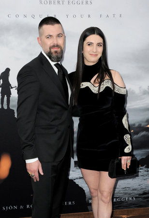 Robert Eggers and Alexandra Shaker at the Los Angeles premiere of 'The Northman' held at the TCL Chinese Theatre in Hollywood, USA on April 18, 2022.のeditorial素材