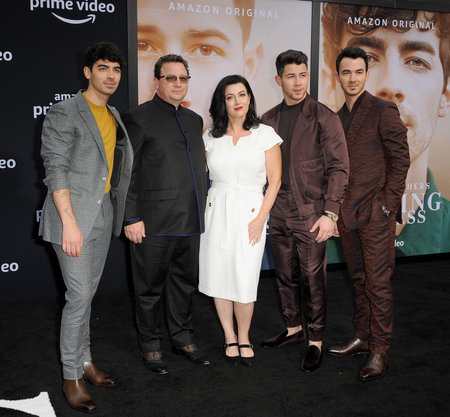 Kevin, Joe, Nick, Paul Kevin Jonas Sr. and Denise Miller-Jonas at the Los Angeles premiere of 'Chasing Happiness' held at the Regency Bruin Theatre in Westwood, USA on June 3, 2019のeditorial素材