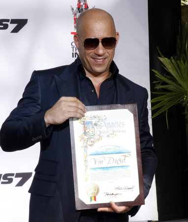 Vin Diesel Immortalized With Hand And Footprint Ceremony held at the TCL Chinese Theatre IMAX in Hollywood, USA on April 1, 2015.のeditorial素材