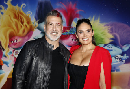 Joey Fatone and Izabel Araujo at the Los Angeles premiere of 'Trolls Band Together' held at the TCL Chinese Theatre in Hollywood, USA on November 15, 2023.のeditorial素材