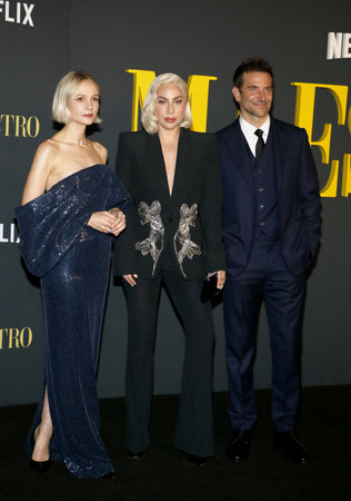 Carey Mulligan, Lady Gaga, and Bradley Cooper at the Maestro' Photo Call held at the Academy Museum of Motion Pictures in Los Angeles, USA on December 12, 2023.のeditorial素材