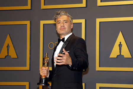 Taika Waititi at the 92nd Academy Awards - Press Room held at the Dolby Theatre in Hollywood, USA on February 9, 2020.のeditorial素材