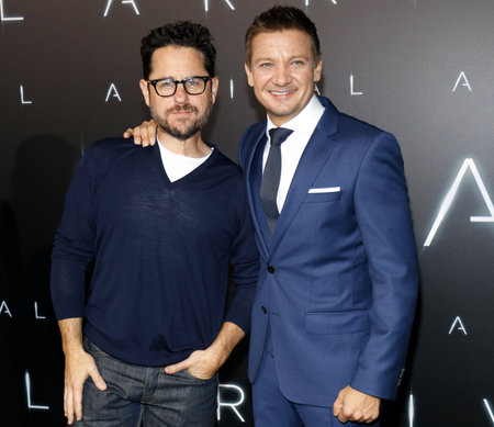 Jeremy Renner and J.J. Abrams at the Los Angeles premiere of 'Arrival' held at the Regency Village Theater in Westwood, USA on November 6, 2016.のeditorial素材
