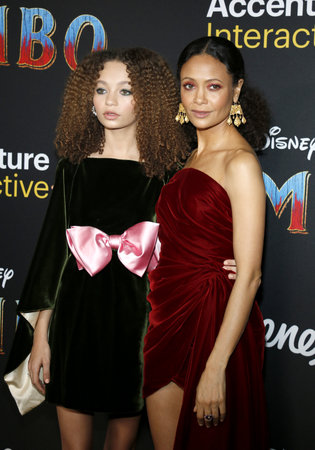 Thandie Newton and Nico Parker at the World premiere of 'Dumbo' held at the El Capitan Theatre in Hollywood, USA on March 11, 2019.のeditorial素材