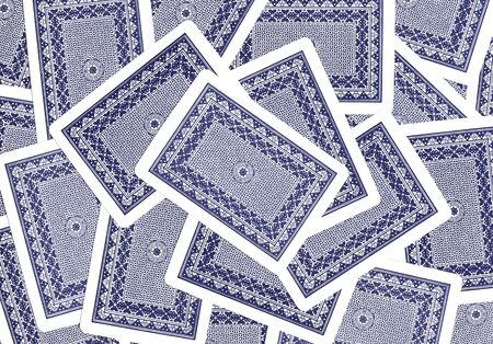Plenty of blue-colored playing cards. Each on another, rear view.のeditorial素材