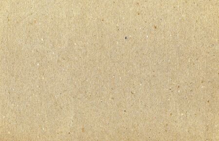 Close-up of grungy sheet of cardboard in brown.の写真素材