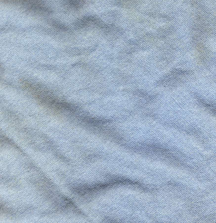 Crumpled blue old dirty fabric with grunges.の写真素材