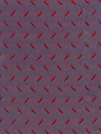 Modern fabric with geometrical pattern in magenta and red.の写真素材