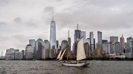 Lower Manhattan Financial District skyscrapers at twilight Panoramic. New York City in a foggy day, USA.の写真素材