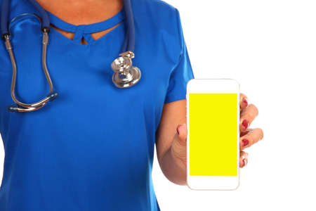 Female doctor with stethoscope handing a blank smartphone isolated over white isolated over white...