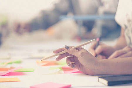 Team succes. Photo young business managers working with new startup project.の写真素材