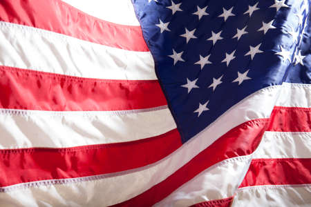 USA flag. American flag. American flag blowing wind.