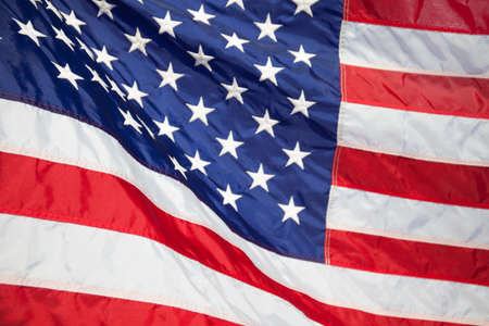 USA flag. American flag. American flag blowing wind.