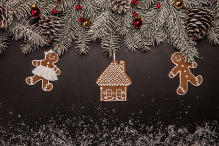 Christmas fir tree with decoration on dark background