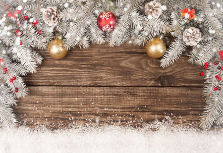 Christmas grunge wooden background with snow fir tree. View with copy spaceの写真素材