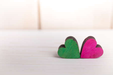 A colorful hearts on a wooden backgroundの写真素材