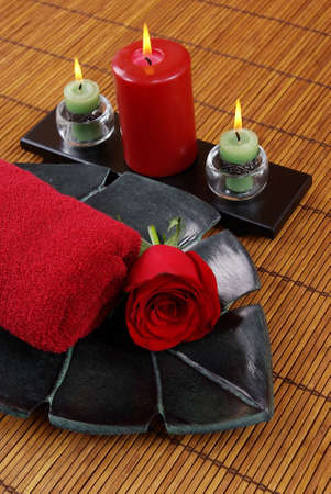 Towel, rose, and candlesの写真素材