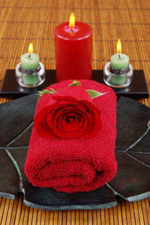 Towel, rose, and candlesの写真素材