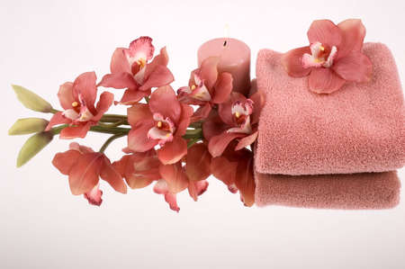 Towel, orchid and candleの写真素材