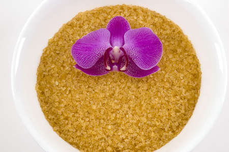Organic raw sugar and orchid from Hawaiiの写真素材