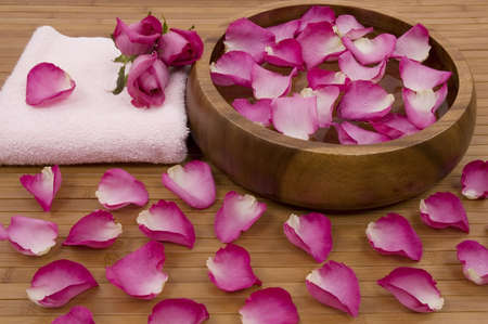 Roses, petals and towel in a spaの写真素材