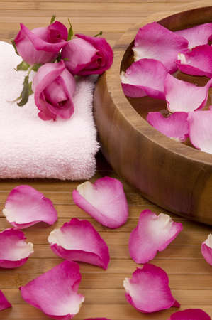 Roses, petals and towel in a spaの写真素材