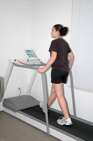 A teenage girl having physical therapy                         