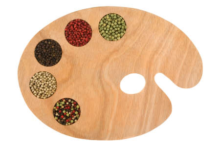 Spice palette ready for the next master chef to create new culinary delights. (variety of peppercorns on artist's palette)の写真素材