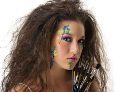 Painter girl with beautiful make up