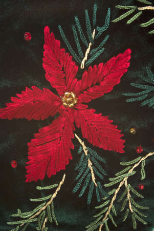 Christmas flower on velvet green stockingの写真素材