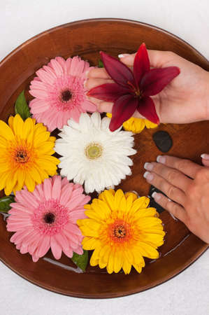 Manicure spa with beautiful flowersの写真素材