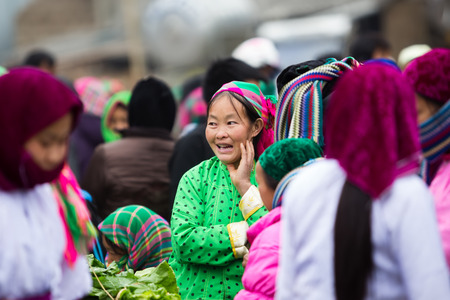 HA GIANG, VIETNAM, FEBRUARY 16, 2014  Unidentified ethnic minority women in a traditional market in Ha Giang, Vietnam  Ha Giang is a northernmost province in Vietnam のeditorial素材