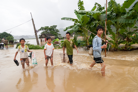NINHBINH, VIETNAM - NOVEMBER 01, 2008  Unidentified children in the flood zone in Gia Vien District, Ninh Binh Province, Vietnam  のeditorial素材
