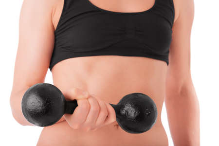 Woman workout with dumbbells isolated on white backgroundの写真素材