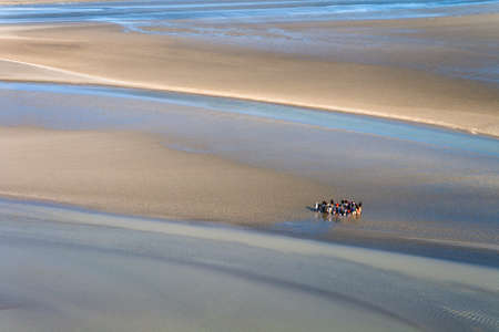 Sea coast at low tide, view from the top of the mount Saint Michael's, Franceの写真素材