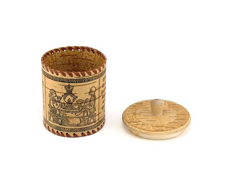 Saltcellar (sugar bowl) from a bark of a birch with an open cover. A photo on a white background.の写真素材