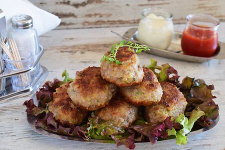 Meatballs with aubergine and tomatosauce, yogurt