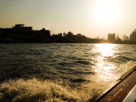 boat ride to work in the morningの写真素材