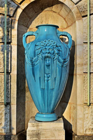 Turquoise art nouveau style vase in the Stadtpark in Viennaの写真素材