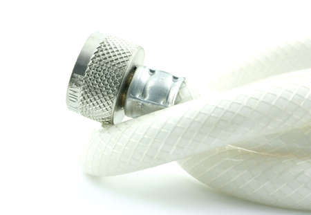 Under sink flexible white water hose with metal fittings. の写真素材