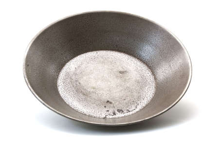 An old all metal grooved side wall gold prospector pan. の写真素材