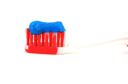 Toothbrush and blue toothpasteの写真素材