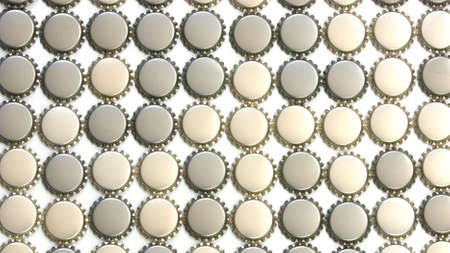 Dozens of beer bottle capsの写真素材