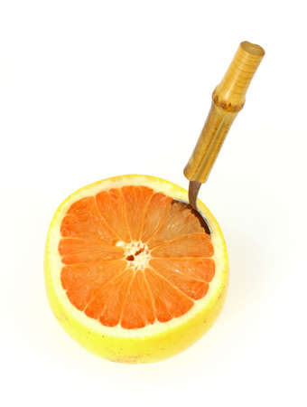 Grapefruit with fruit spoonの写真素材