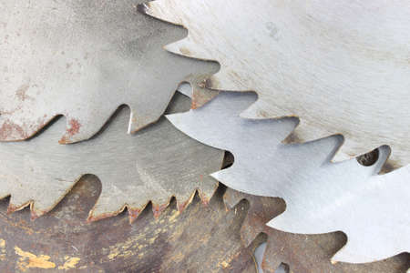 An assortment of used circular saw blades.の写真素材