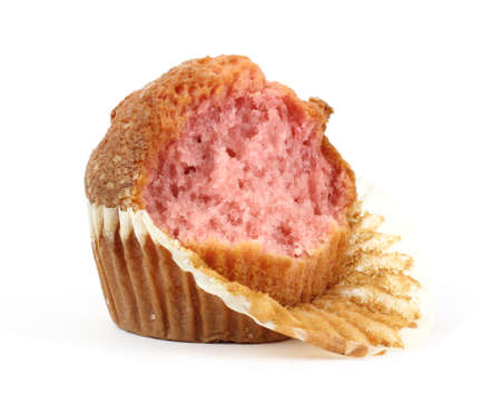 A strawberry muffin that has been partially eaten on a white background.の写真素材